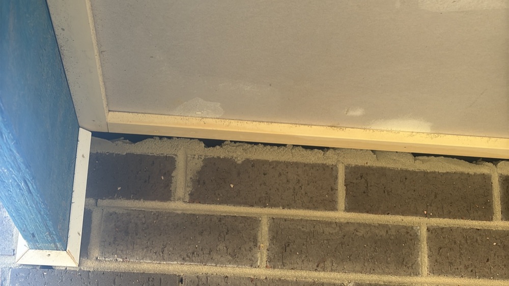 Alfresco brickwork not built to the required height, recorded during a fixing inspection in Donnybrook