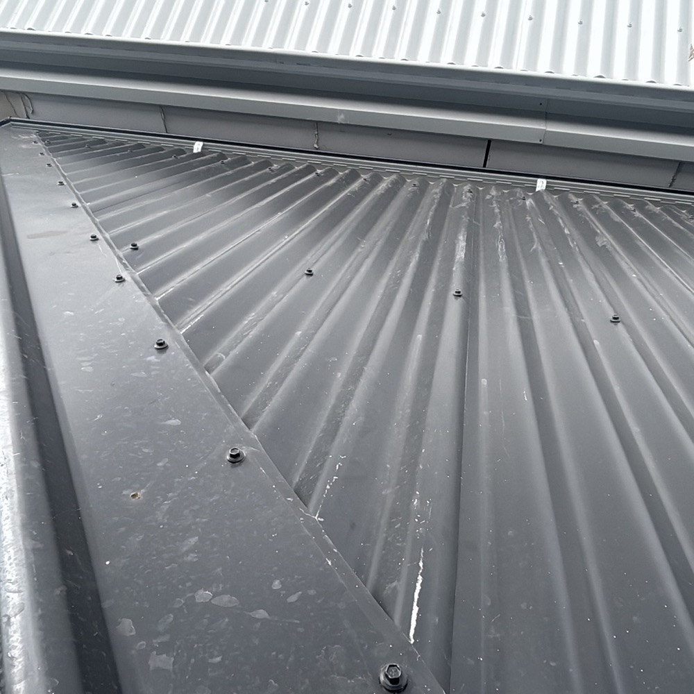 Metal fascia and gutter damaged before handover, recorded during a fixing inspection in Donnybrook