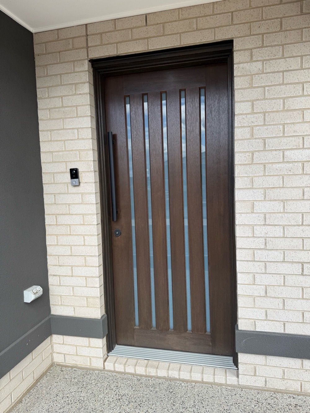 Front entry door investigated after the owner reported draughts, recorded during a defect investigation in Donnybrook