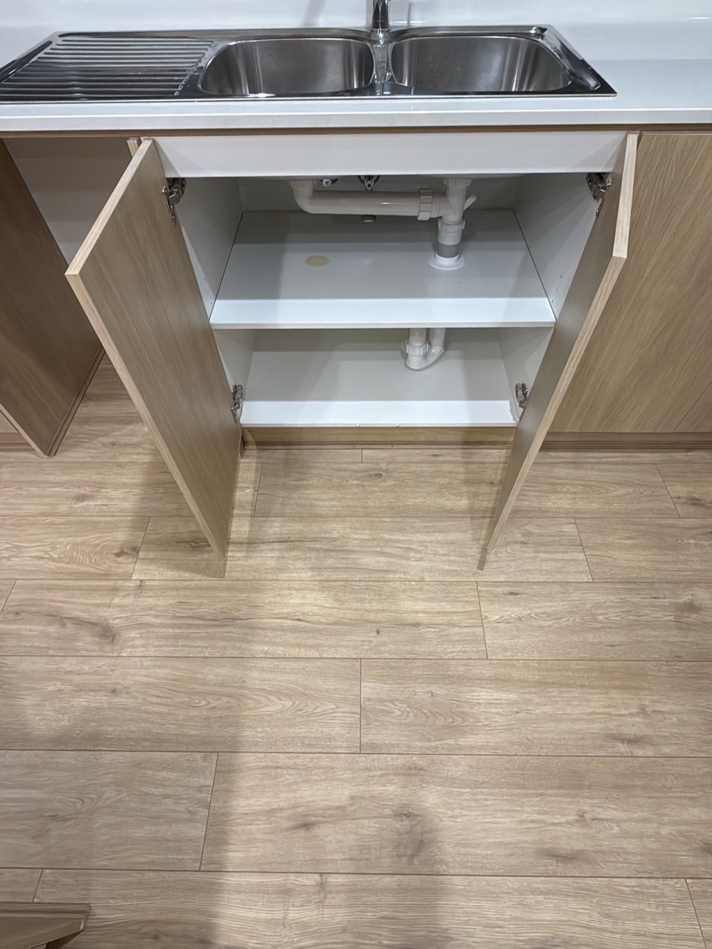 Mixer and pipework leaking at inspection, recorded during a pre-handover inspection in Donnybrook