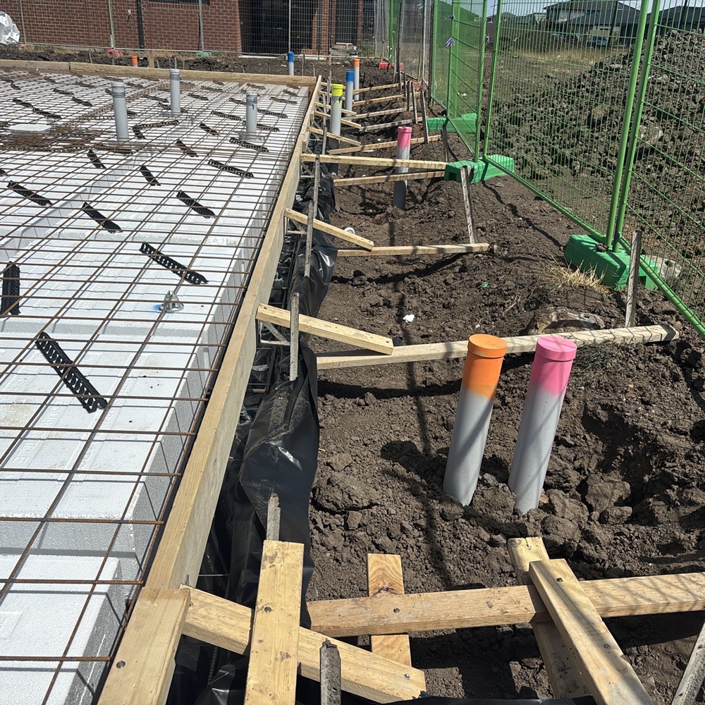 Star picket and reo bar caps not installed, leaving an impalement risk, recorded during a slab pre-pour inspection in Donnybrook